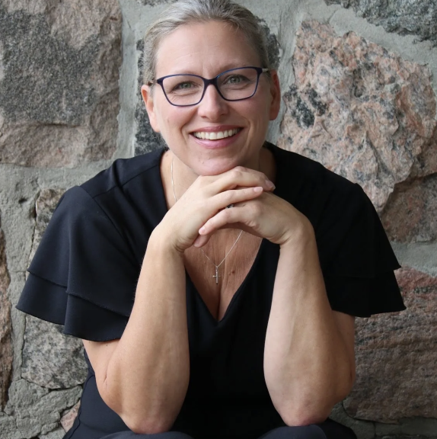 Angie Reichenbach is a prominent conductor of choirs